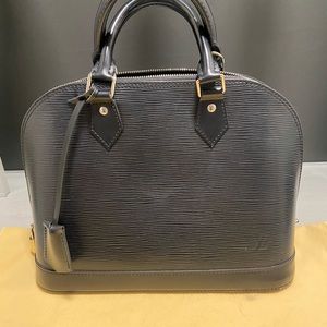 Louis Vuitton Alma PM  handbag in epi leather